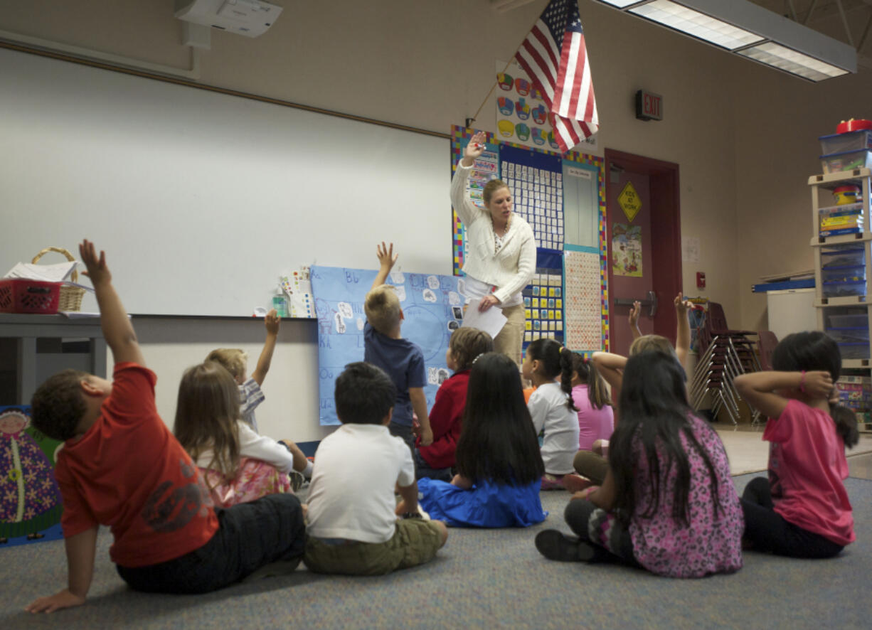 Incoming kindergartners get an early start on school inside Tammi Hoffman&#039;s classroom at Roosevelt Elementary School in August 2012.