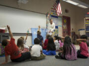 Incoming kindergartners get an early start on school inside Tammi Hoffman&#039;s classroom at Roosevelt Elementary School in August 2012.