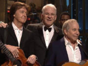 Paul McCartney, from left, Steve Martin and Paul Simon appear on the 40th anniversary special of "Saturday Night Live" in February 2015.