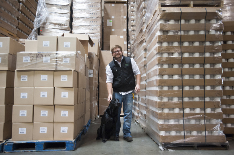 David Humphrey, production manager at Biokleen , with his Lab Gus, at his company's facility in Vancouver.