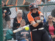 Battle Ground&#039;s Danielle Joli connects with a Skyview pitch during the Tigers&#039; 4-0 win over the Storm in the 4A district championship softball game. Battle Ground will host Redmond in a bi-district playoff game on Friday or Saturday.