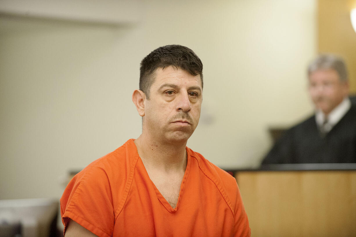 Ruben Prado Blancas, 43, makes a first appearance Monday in Clark County Superior Court on suspicion of two counts of attempted first-degree murder and first-degree domestic violence burglary. Blancas is accused of shooting and wounding two people at a home in Five Corners.