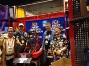 East Vancouver: Evergreen High School junior Donavan Eyler, right, with Lego officials.