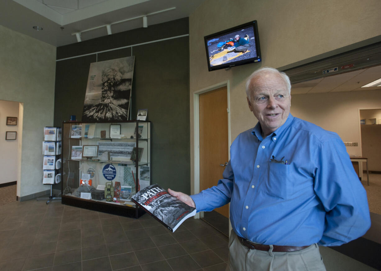 Richard Waitt: “The survivors inside the surge are speaking for tens of thousands of others,” whether they survived or perished in volcanic eruptions over the centuries. Waitt, a U.S. Geological Survey scientist, holds a copy of his book, "In the Path of Destruction: Eyewitness Chronicles of Mount St.