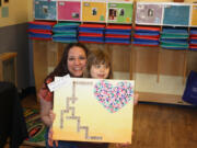 Salmon Creek: Mom Phaedra and daughter Izzy Karoy at The Goddard School&#039;s Children&#039;s Art Gala.