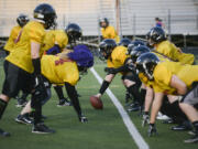 Members of the Portland Fighting Shockwave, a women's full-contact football team, practice at Milwaukie High School on Friday, May 6, 2016.