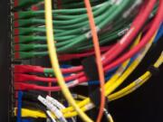 Wires and cables are seen in a server room in Vancouver Friday April 29, 2016.