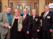 Central Park: Jane Hagelstein, second from left, accepting her presidential award, along with Royce Pollard, left, former Vancouver mayor, Les Burger, retired military officer, Kelly Jones, resource center manager, and Bob Knight, Clark College president.