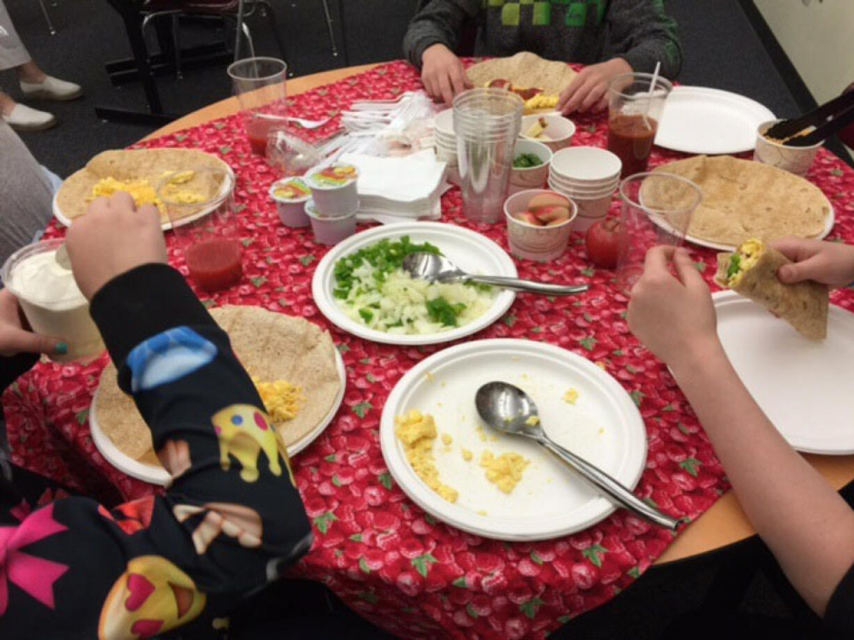 Five Corners: Winners of the Covington Middle School &quot;Create An Ad for School Breakfast,&quot; for which they received a private breakfast from Rene Huerta, a food sense educator at Washington State University Extension.