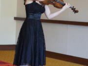 Lake Shore: Symphony Koss, seen here warming up before a national competition in Texas this April, earned a full scholarship to the Interlochen Arts Camp in Michigan.