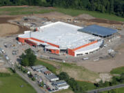 As seen in this aerial photo taken Friday morning, construction on the new Cowlitz casino along Interstate 5 at Exit 16 is about 40 percent complete, according to the Cowlitz Tribe. Clark County health officials are recommending the casino hook up to the city of La Center&#039;s sewer system out of public health necessity.