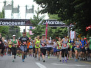 Runners start the Vancouver USA Marathon in 2015.