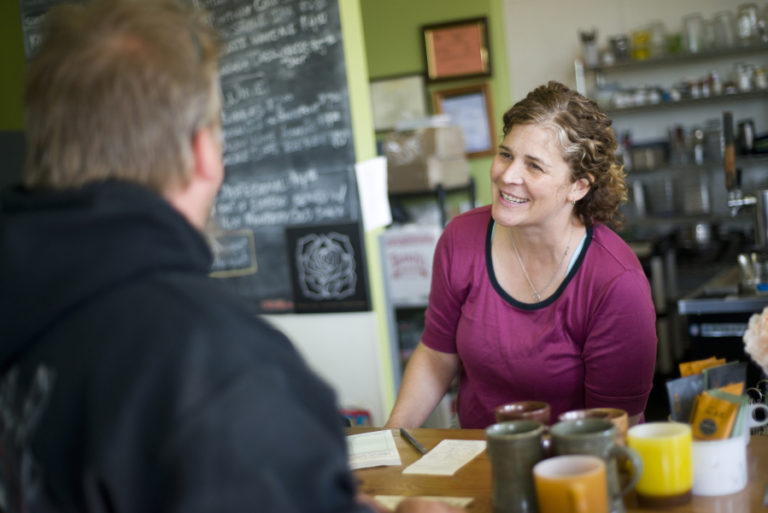 Amy Fry, right, takes an order at OurBar in Washougal on Friday, May 13, 2016. OurBar opened three years ago and has been part of Washougal&#039;s transition to a hot spot for young business owners.