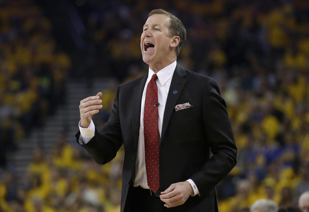 Portland Trail Blazers head coach Terry Stotts yells during the first half in Game 1 of a second-round NBA basketball playoff series against the Golden State Warriors in Oakland, Calif., Sunday, May 1, 2016.