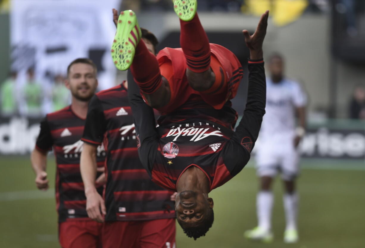 Portland Timbers forward Dairon Asprilla flips after scoring a goal during the second half of an MLS soccer game against the Vancouver Whitecaps in Portland, Ore., on Sunday, May 22, 2016.