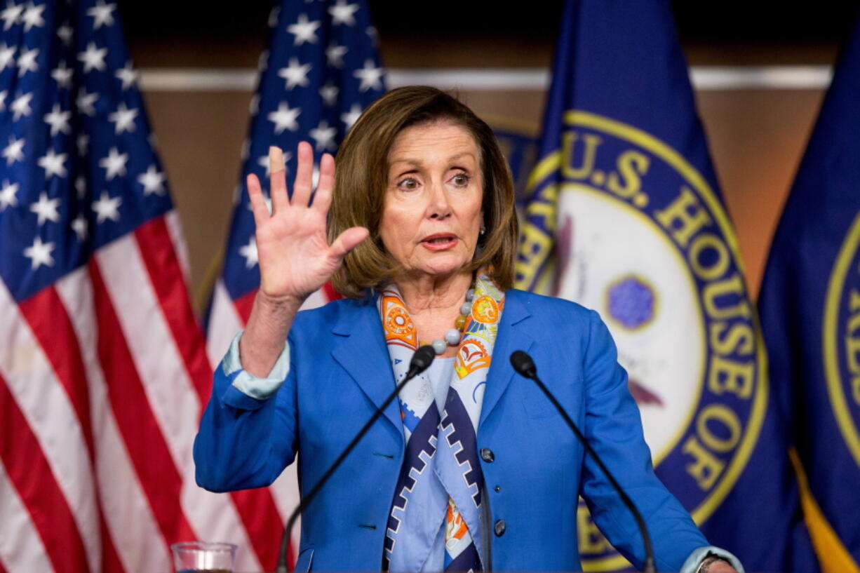 House Minority Leader Nancy Pelosi of California speaks during her weekly news conference on Capitol Hill in Washington on Thursday. In a breakthrough, House Republicans and Democrats have agreed to a deal to help rescue Puerto Rico from $70 billion in debt.