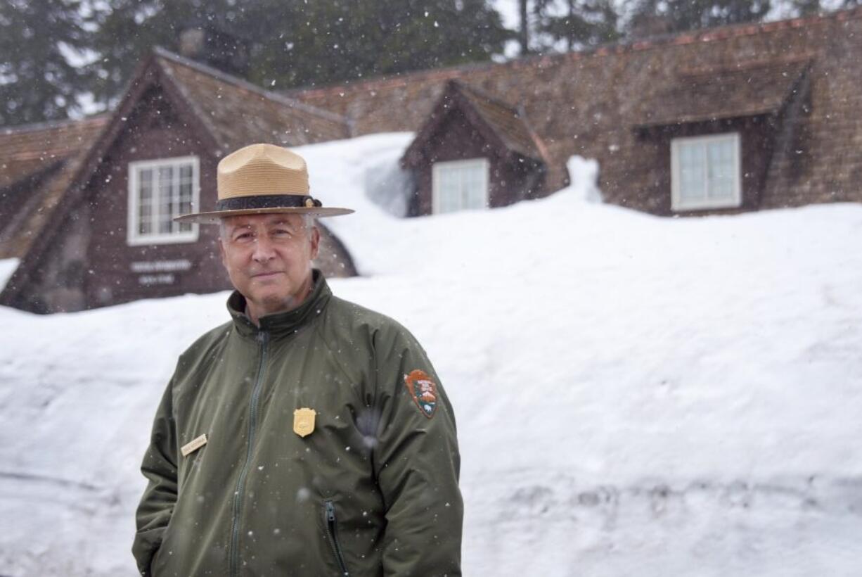 Craig Ackerman stands for a portrait in front of the Crater Lake Visitor&#039;s Center on April 23. Ackerman, Crater Lake National Park&#039;s superintendent, is passionate about Oregon&#039;s impressive land feature.