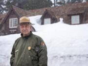 Craig Ackerman stands for a portrait in front of the Crater Lake Visitor&#039;s Center on April 23. Ackerman, Crater Lake National Park&#039;s superintendent, is passionate about Oregon&#039;s impressive land feature.