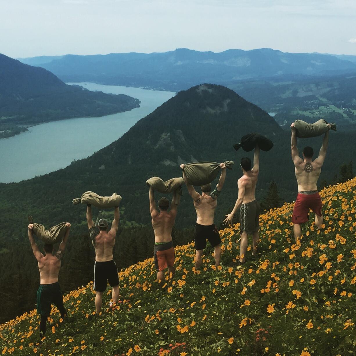 From left, amid the balsamroot atop Dog Mountain: Fletcher Quade, Ryan Hite, Joey Rojan, Aaron Sieczkowski, Luke Galeotti, Michael Galeotti.