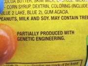 FILE - In this April 8, 2016 file photo, a new disclosure statement is displayed on a package of Peanut M&amp;M&#039;s candy in Montpelier, Vt., saying they are &quot;Partially produced with genetic engineering.&quot; Genetically manipulated food remains generally safe for humans and the environment, a high-powered science advisory board declared in a report Tuesday, May 17, 2016.