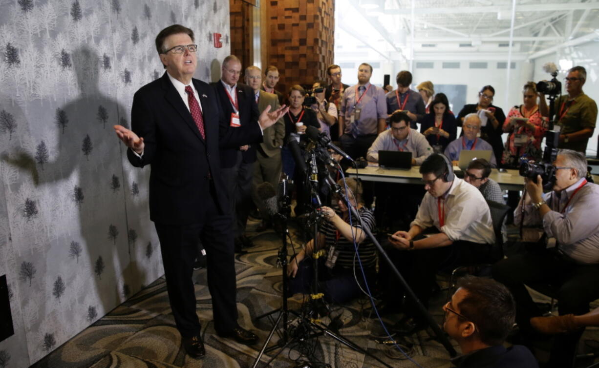 Texas Lt. Gov. Dan Patrick speaks during a news conference at the Texas Republican Convention Friday, May 13, 2016, in Dallas. Texas is signaling the state it will challenge an Obama administrative directive over bathroom access for transgender students in public schools.