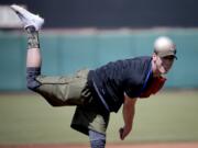 Pitcher Tim Lincecum throws for MLB baseball scouts, Friday, May 6, 2016, at Scottsdale Stadium in Scottsdale, Ariz. The former two-time Cy Young award winner is currently a free agent working his way back from hip surgery.