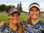 Alexandra Barter, left, hit the game-winning home run and Kayla Moore pitched a shutout in Skyview's 2-0 win over Camas in the 4A Greater St. Helens League district softball tournament on Tuesday.