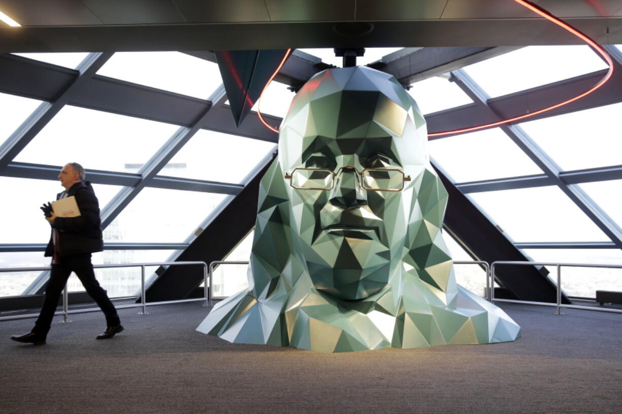 A person walks past a sculpture of Benjamin Franklin at the One Liberty Observation Deck in Philadelphia. The City of Brotherly Love will get a lot of attention later this summer during the Democratic National Convention, with attractions ranging from American history classics to new parks and outdoor venues.