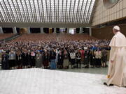 Pope Francis arrives for a special audience with Superiors General of Institutes of Catholic Women Religious in the Paul VI Hall at the Vatican on Thursday. Pope Francis said Thursday he is willing to create a commission to study whether women can be deacons in the Catholic Church, signaling an openness to letting women serve in ordained ministry currently reserved to men.