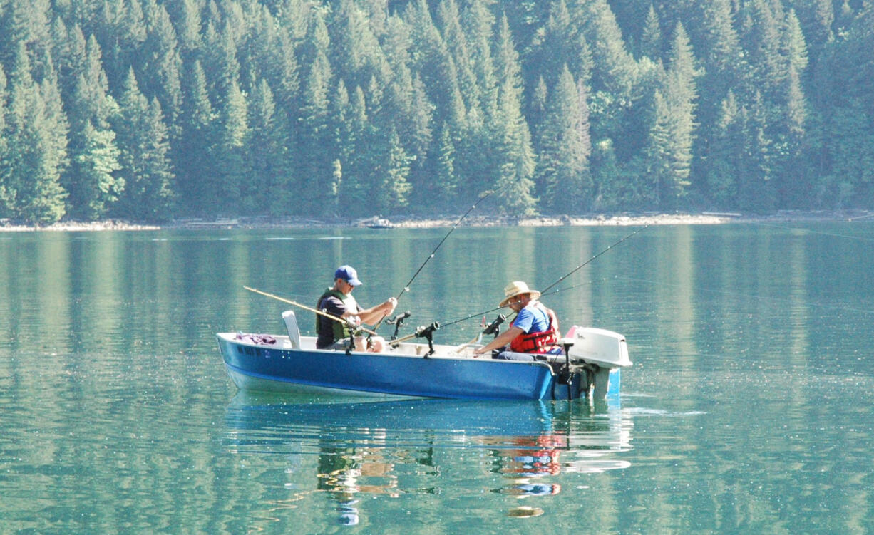 Kokanee fishing has improved at Merwin Reservoir, but remains inconsistent.  These anglers are taking advantage of Washington's two-rod endorsement fee.