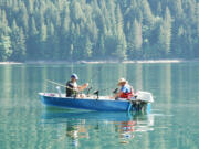 Kokanee fishing has improved at Merwin Reservoir, but remains inconsistent.  These anglers are taking advantage of Washington's two-rod endorsement fee.