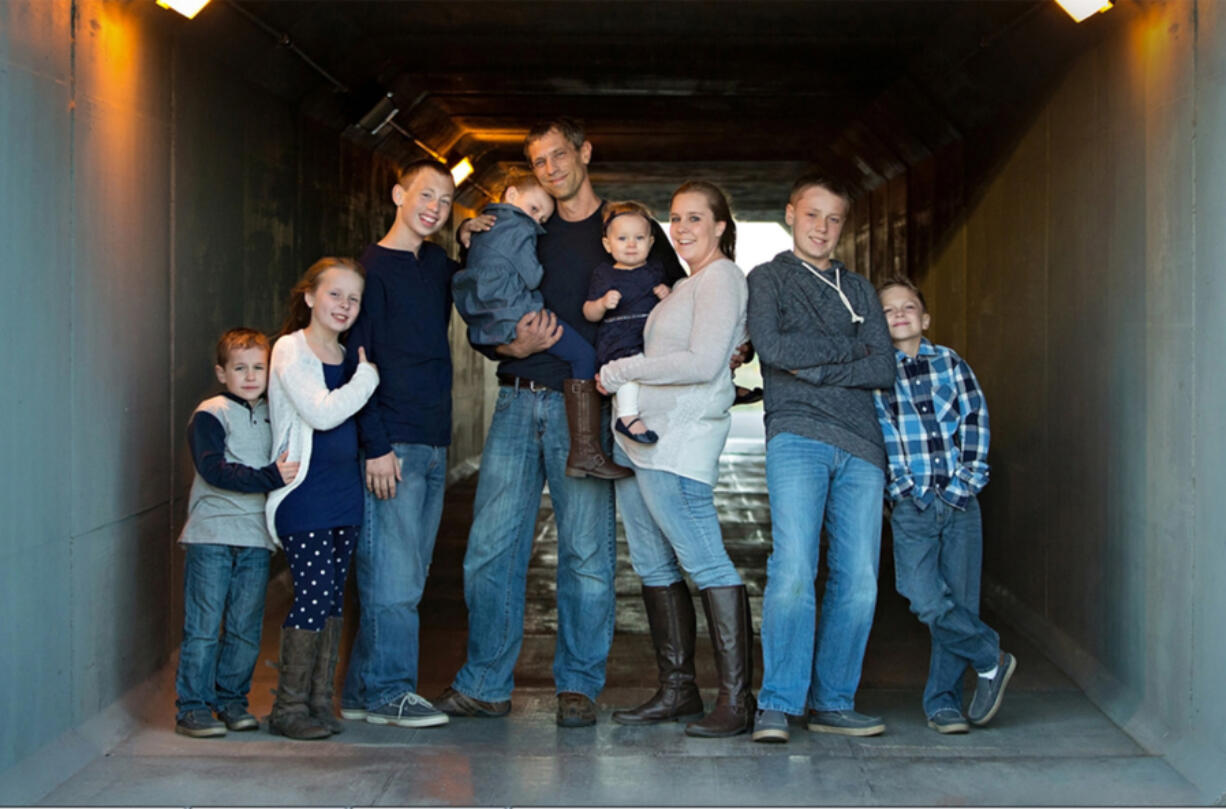 Timothy and Kyla Buller of Bismarck, N.D., have seven children and are not religious.