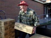 Bill Jessett, shown in 2003, volunteered to help feed the needy with the Inter-Faith Treasure House for around 30 years. He was killed in a car crash in Camas on Wednesday. He was 88.