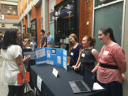 Hockinson Middle School students Gabriella Morley, from left, Christa Phillips, Jasmine Shigeno and Madelynn Willis placed third in the statewide Youth Apps Challenge on June 4.