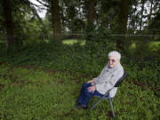 Hazel Stein, 99, enjoys the birds and squirrels June 2 in central Vancouver&#039;s Tanglewood Park. Behind the chain-link fence lies the land she is donating to the city to expand the park by nearly an acre. Additional land acquisitions will result in the park growing to a total 3.4 acres.