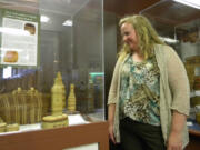 Katie Anderson, executive director of the Clark County Historical Museum, with a display of Indian basketry nearing the end of its run.