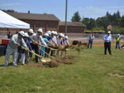 Washougal School District hosted a groundbreaking ceremony on Tuesday to officially kick off construction of a new building that will house Jemtegaard Middle School and Columbia River Gorge Elementary School students. The building is expected to open in fall 2017.