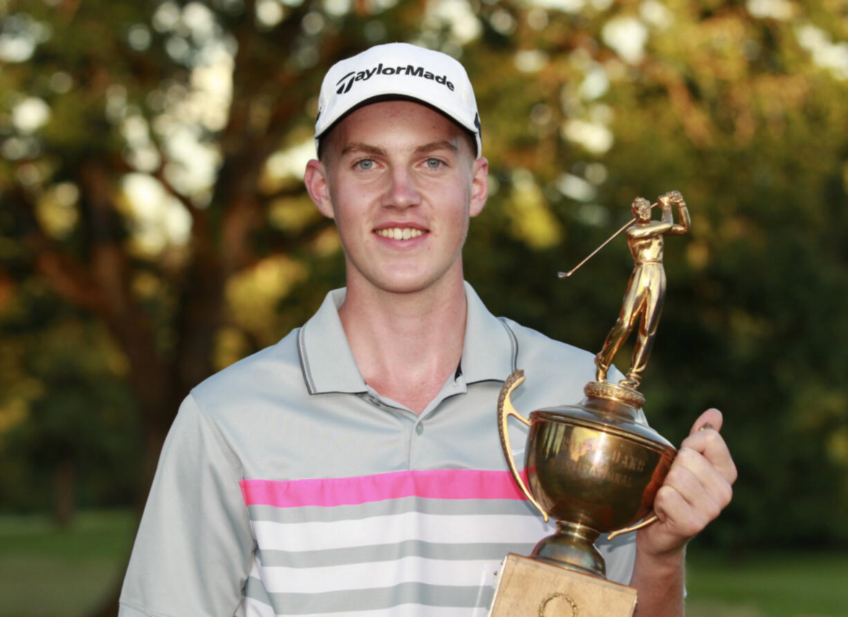 Royal Oaks Invitational champion Spencer Tibbits with his trophy.