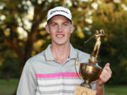 Royal Oaks Invitational champion Spencer Tibbits with his trophy.