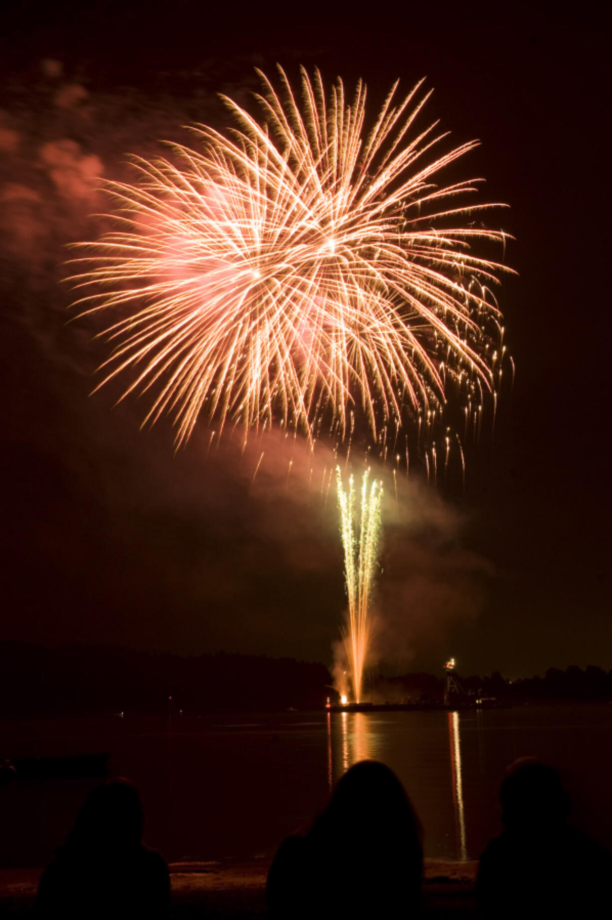 Fireworks fly at Cottonwood Beach in Washougal in 2009. Last month, the Washougal City Council voted in favor of giving the mayor the ability to restrict the discharge and sale of fireworks during times of extreme fire damage, after consulting with the fire marshal and chief.