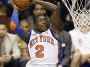 New York Knicks' Nate Robinson leaps during the slam dunk contest at the NBA All-Star Game Saturday Night in Dallas in 2010. The Seattle Seahawks gave the former NBA standout and one-time college football player a tryout on Monday, June 13, 2016.