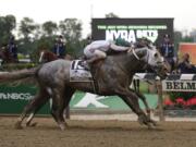 Creator, with jockey Irad Ortiz Jr. up, edges out Lani, with Yutaka Take up, to win the 148th running of the Belmont Stakes horse race, Saturday, June 11, 2016, in Elmont, N.Y.