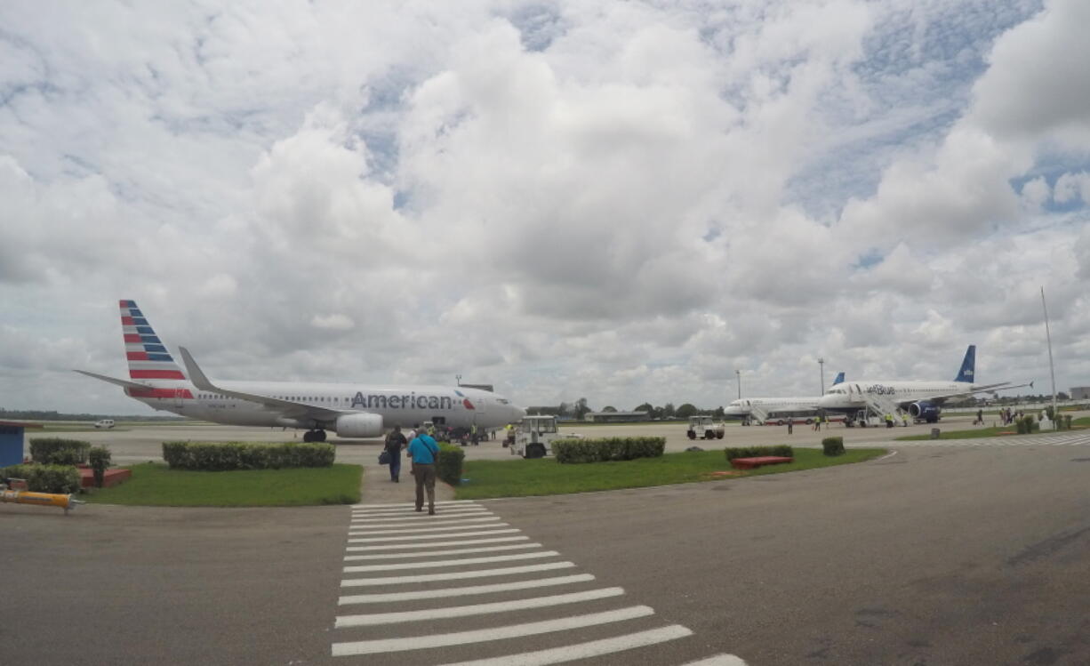 American Airlines and JetBlue Airways charter flights wait to depart from Havana&#039;s Jose Marti International Airport. The Department of Transportation said Friday that six airlines: American, Frontier, JetBlue, Silver Airways, Southwest and Sun Country, have been selected for routes to nine Cuban cities other than Havana.