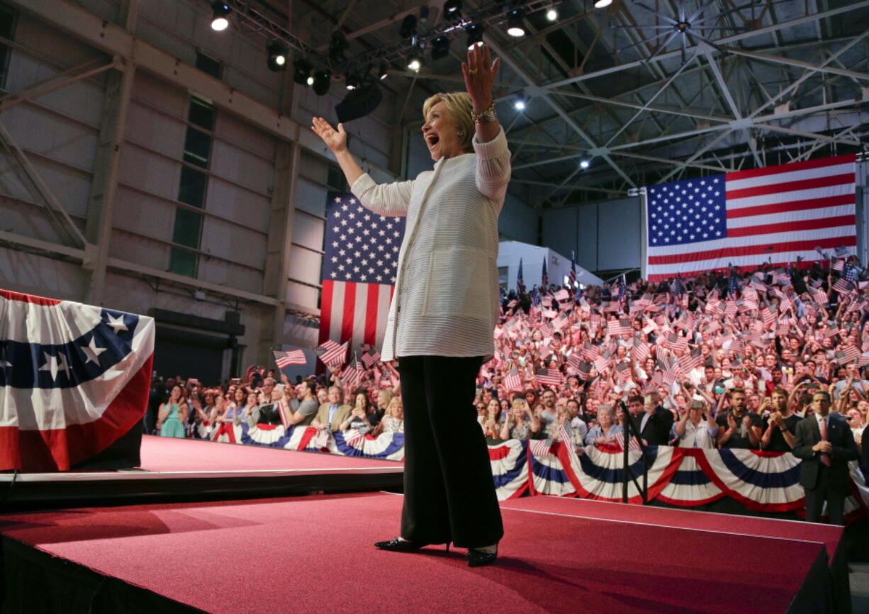 Democratic presidential candidate Hillary Clinton reacts to supporters Tuesday during a presidential primary election night rally in New York.