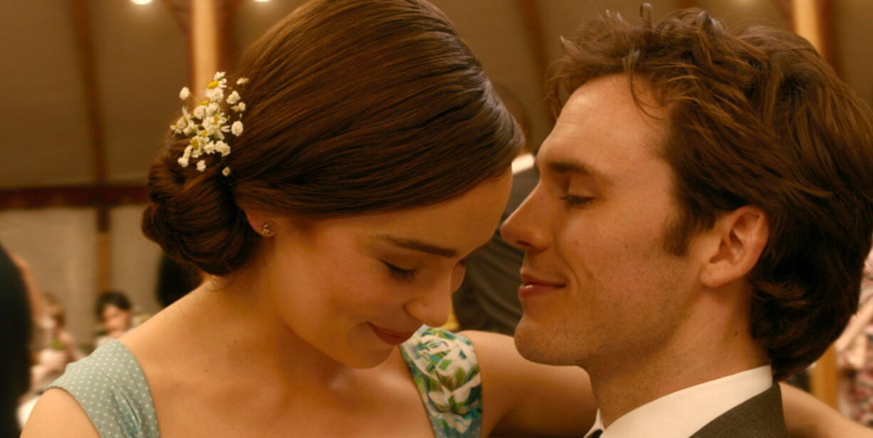 Emilia Clarke, left, and Sam Claflin share an intimate moment in &quot;Me Before You.&quot; (Warner Bros.