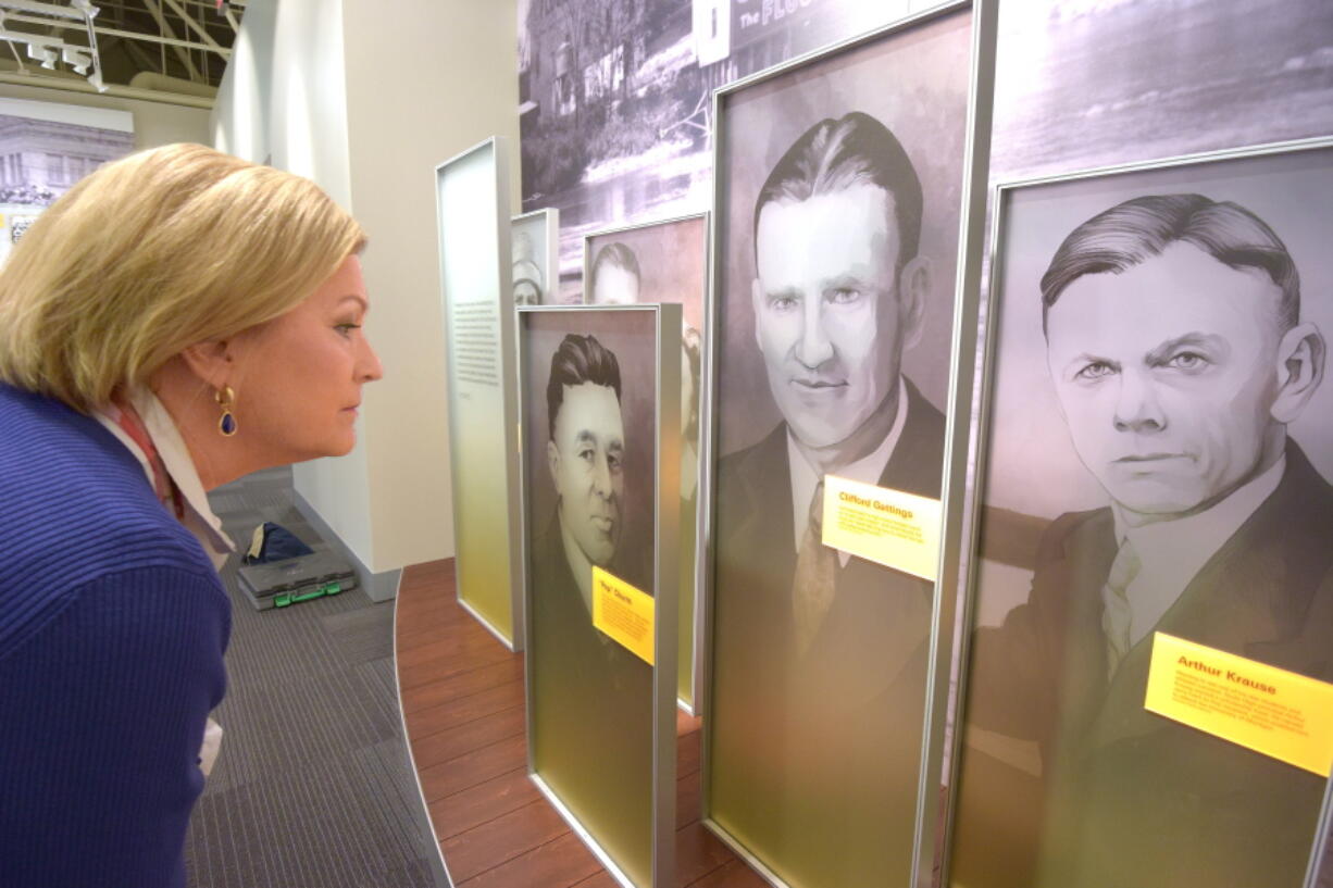 Susan Ford Bales, daughter of late President Gerald R. Ford, looks over a new exhibit at the Gerald R. Ford Presidential Museum in Grand Rapids, Mich. The museum reopens June 7 after being closed since the fall for renovations. (Dale G.