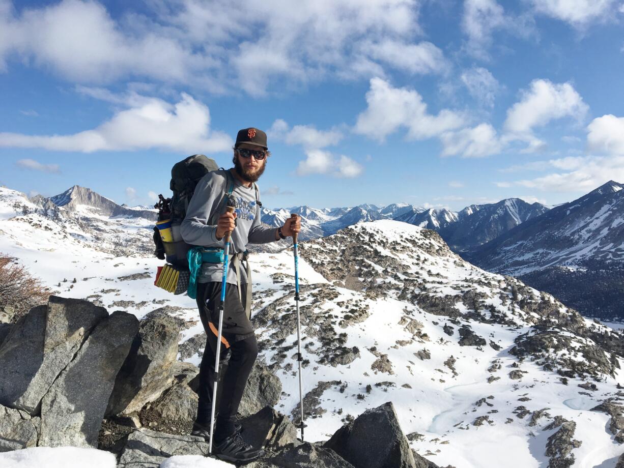 Jeff Garmire of Vancouver stops for a photo at Glen Pass, elevation 11,978 feet, at mile 791 on the Pacific Crest National Scenic Trail.