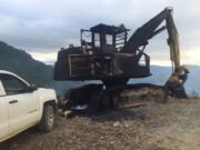 Skamania County sheriff's deputies are investigating a Thursday fire above Mill A as arson. The fire damaged two acres and three pieces of logging machinery.