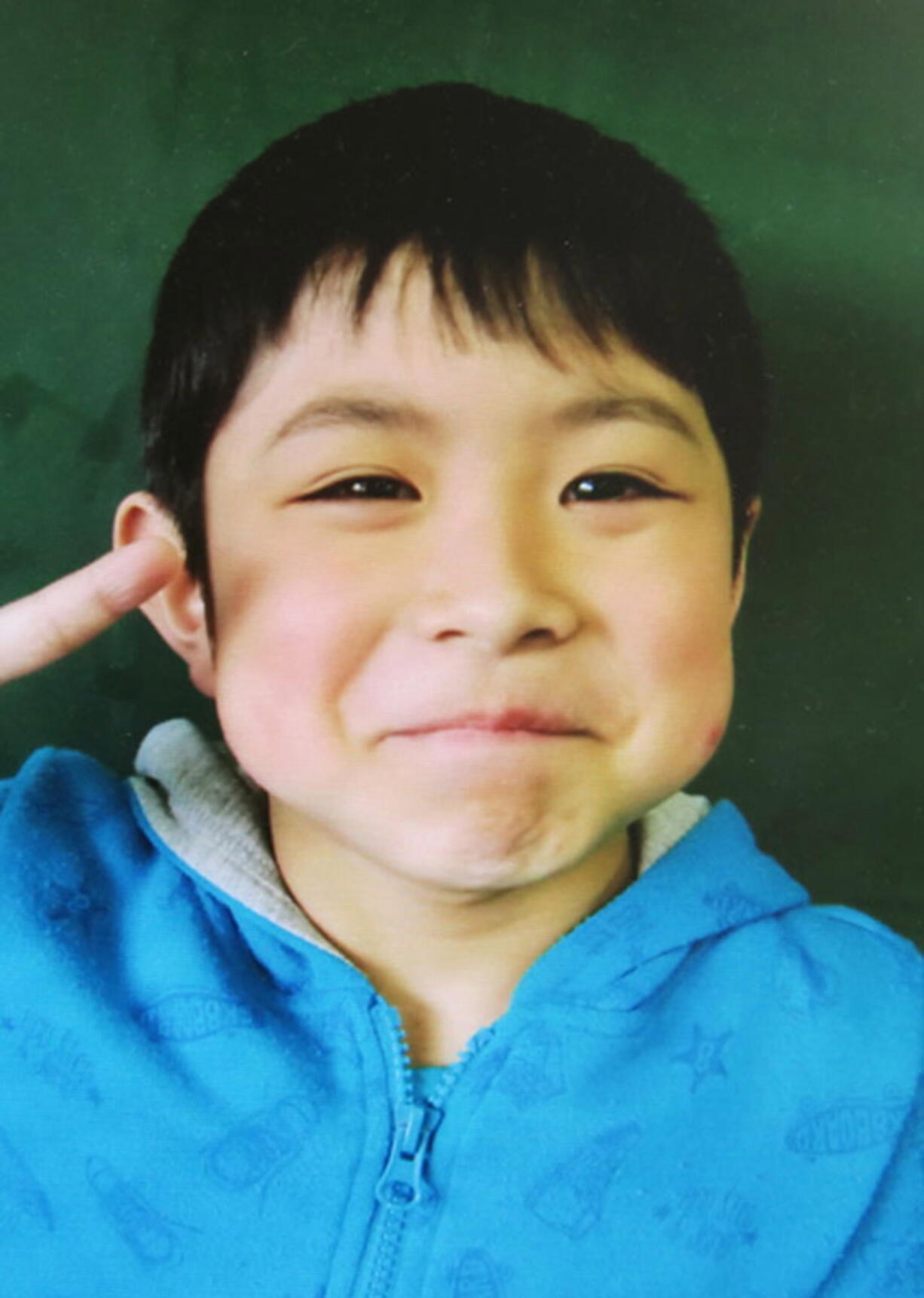 This undated photo released Friday by Hamawake Elementary School shows 7-year-old Yamato Tanooka, who was found safe nearly a week after he was abandoned in the forest by his parents in Nanae, Hokkaido, northern Japan. The boy&#039;s safe return was welcomed in a nation riveted by his disappearance and undergoing intense soul-searching about how it raises and disciplines its children.