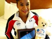 Vancouver's Jordan Chiles shows her awards for making the 2016 USA Junior National gymnastics team.